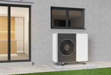 Air heat pump standing outdoors. Modern, environmentally friendly heating