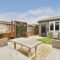 Neat patio with sitting area