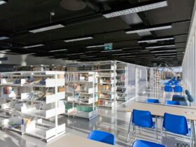 Public Library Interior, modern building with book shelves