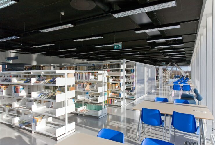 Public Library Interior, modern building with book shelves