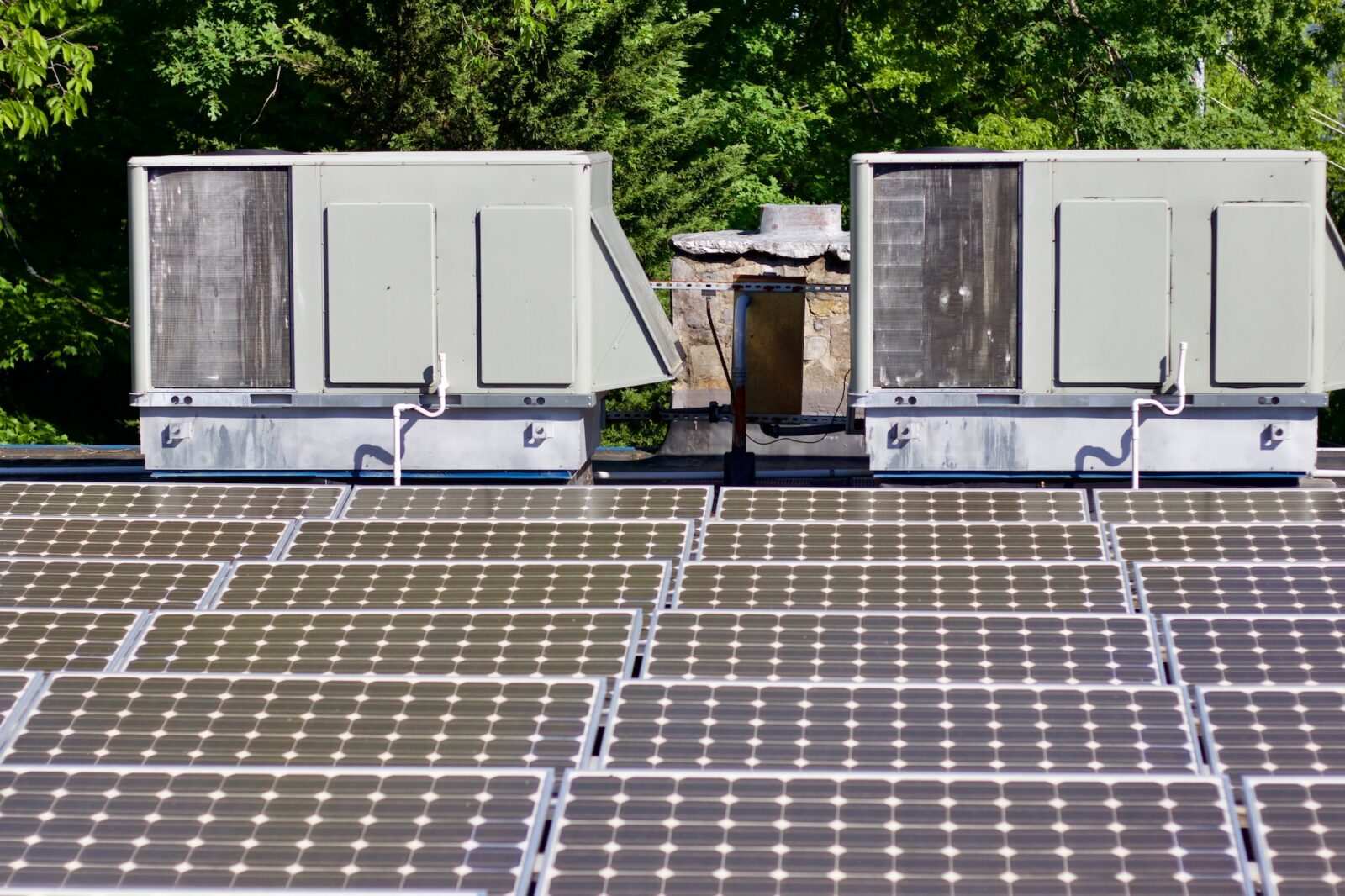 Rooftop solar panels connected to HVAC systems