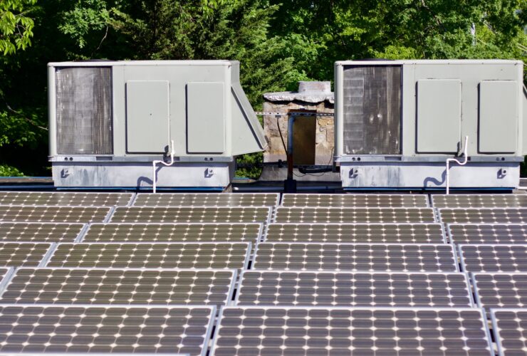 Rooftop solar panels connected to HVAC systems
