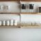 Shelves with glasses and coffee makers