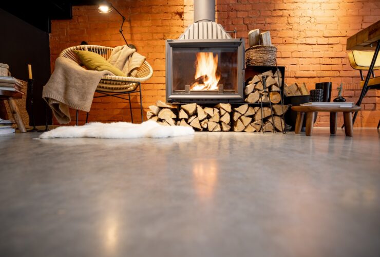 Burning fireplace with firewood at home