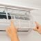 Changing the filter of the air conditioner. Changing filter in air conditioning.