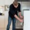 Couple making lunch on a withe kitchen at home