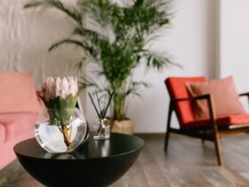 Flower on the table in stylish living room.