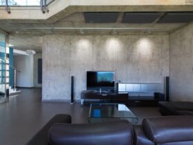 Living room in interior of modern concrete house.