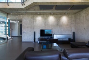 Living room in interior of modern concrete house.
