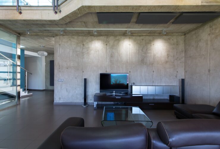 Living room in interior of modern concrete house.