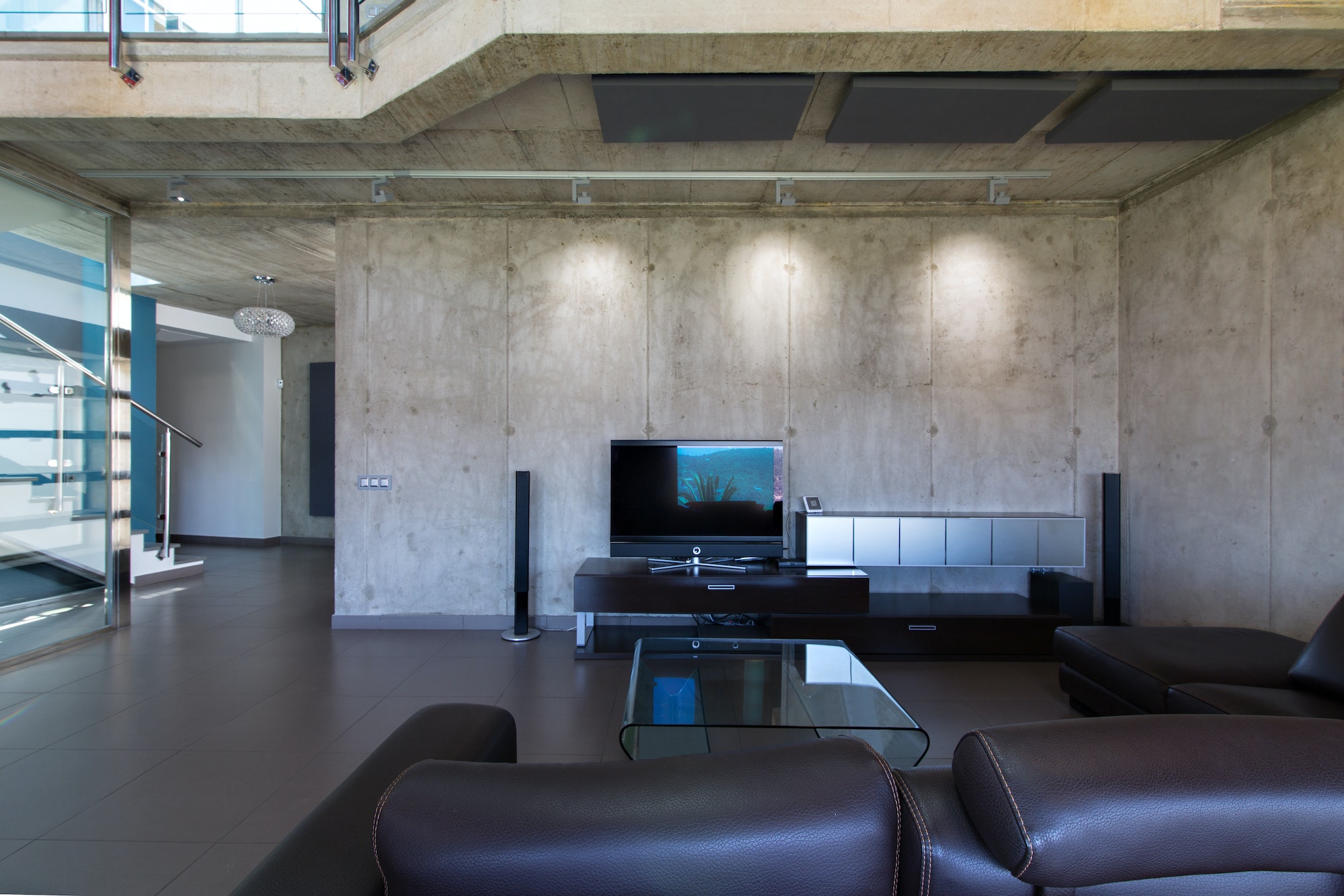 Living room in interior of modern concrete house.