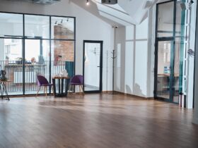Modern empty office room with wooden floor