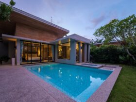 Modern house with a swimming pool, modern pool villa at the beach