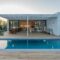 Modern house with garden swimming pool and wooden deck