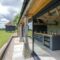 Open-air kitchen and backyard in modern home