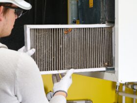 Replacing filter in the central ventilation system. hvac filter replacing home central air system