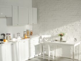 sunlight in white modern kitchen with cooking utensils