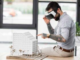 virtual reality architect in virtual reality headset pointing with finger at model of house