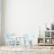 Bright children's room with kids table and shelves near window, kids furniture, kids room