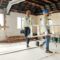 Construction worker, busy and team working building development, maintenance and property upgrade t