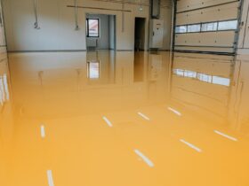 New epoxy floor in warehouse factory. Construction series