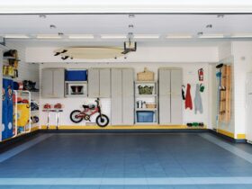 Surfboards and bicycles in empty garage