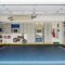 Surfboards and bicycles in empty garage