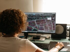 Architect female drawing with cad software BIM