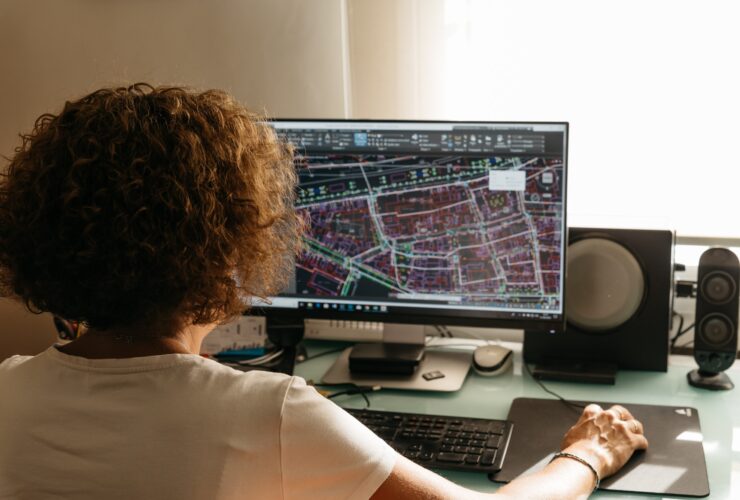 Architect female drawing with cad software BIM