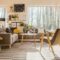 Low angle view of a scandinavian, sunlit living room interior wi