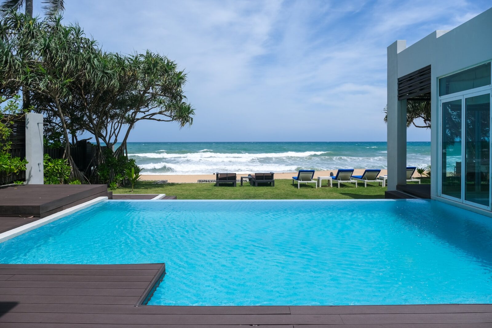 Modern house with a swimming pool, modern pool villa at the beach