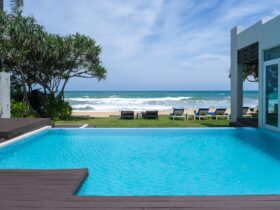 Modern house with a swimming pool, modern pool villa at the beach