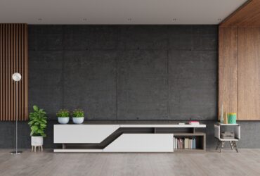 Mortar rack TV with cement screen wall on the wall in modern living room.