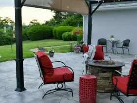 Comfortable outdoor living space with a gas fire pit during the day