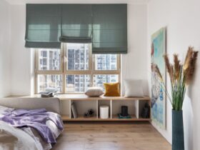 A Minimalist Apartment With A Cozy Gathering Space And A Color Splash 39