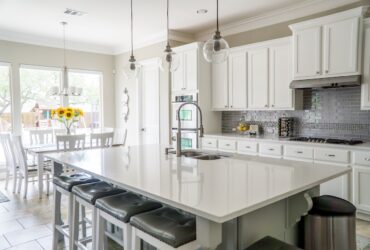 A Tidy Kitchen With A Large Countertop