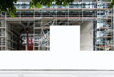 Construction site with blank construction fence mockup