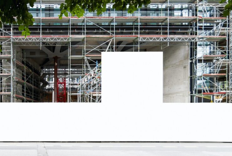 Construction site with blank construction fence mockup