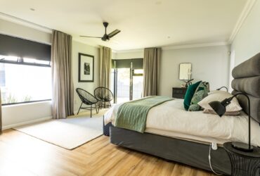 Interior of modern bedroom with furniture at home