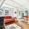 10 Colorful Global-Style Living Room Designs with Bold Furniture And Artworks
