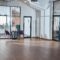 Modern empty office room with wooden floor