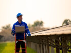 workers installing solar panels, for efficient energy in the city