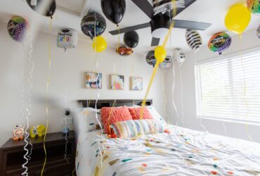 Graduation balloons in a bedroom