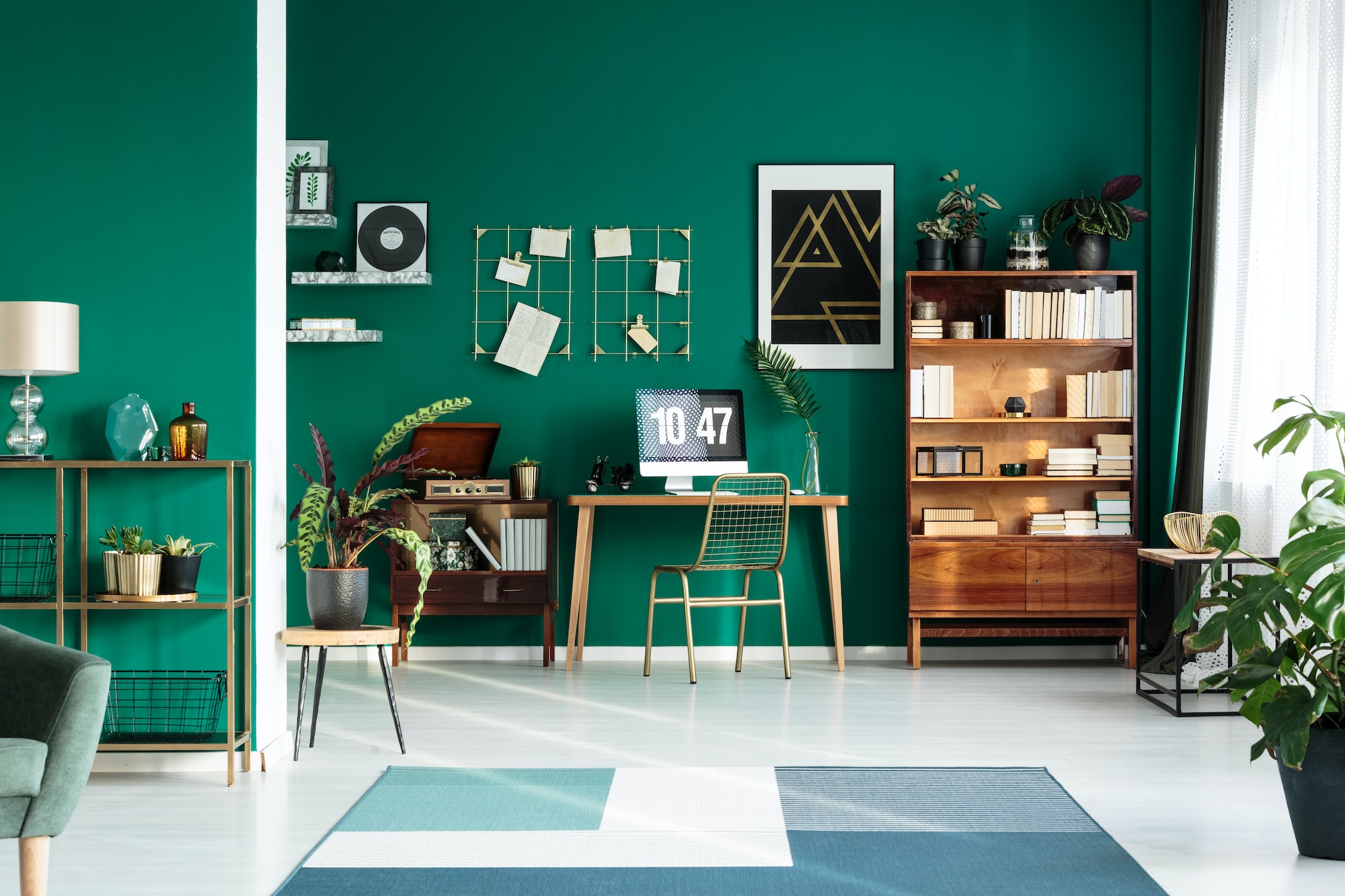 Teal interior with modern workspace
