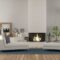 5 Modern Living Room Ideas Featuring A Fireplace And Series of Niche Shelves for Displaying Decor