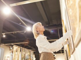 Art Gallery Manager Hanging Paintings