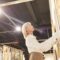 Art Gallery Manager Hanging Paintings