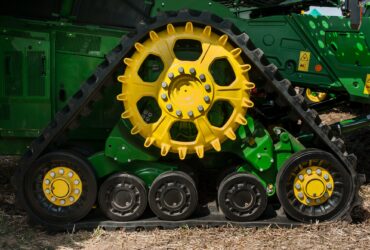 Bilogirya, Khmelnytsky region, UKRAINE - August 19, 2021: semi-tracked John Deere combine