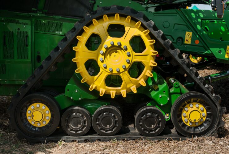 Bilogirya, Khmelnytsky region, UKRAINE - August 19, 2021: semi-tracked John Deere combine