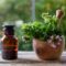 Citronella geranium essential oil on table, close up. Aromatherapy oil, mosquito repellent